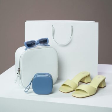Stylish display of fashion accessories including sandals and sunglasses for a modern look.