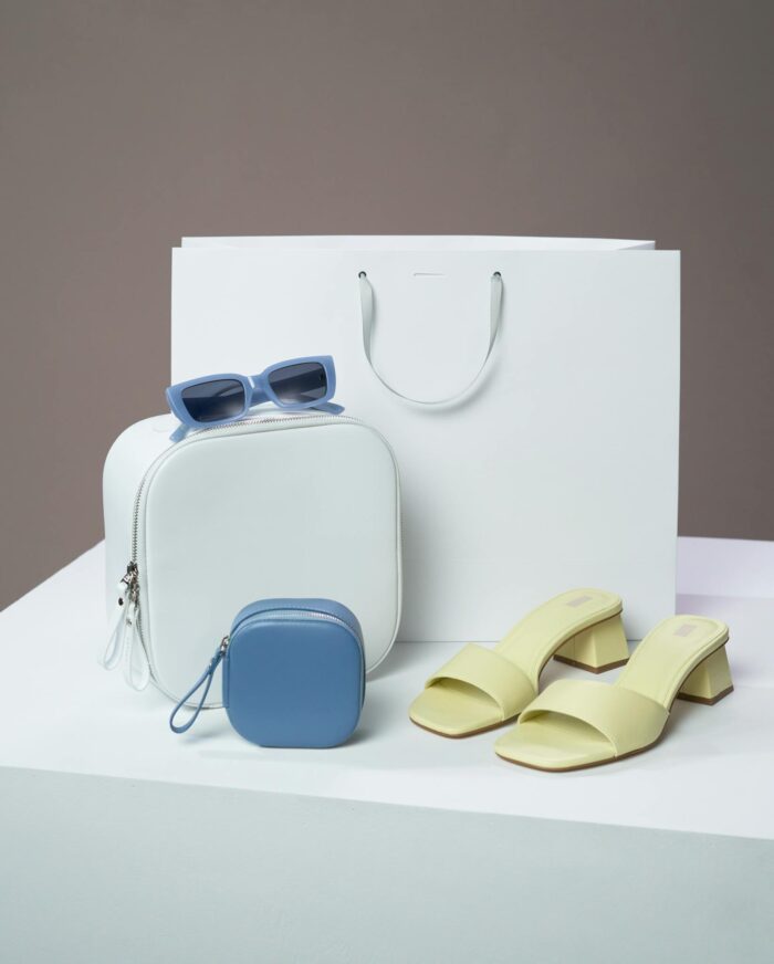 Stylish display of fashion accessories including sandals and sunglasses for a modern look.